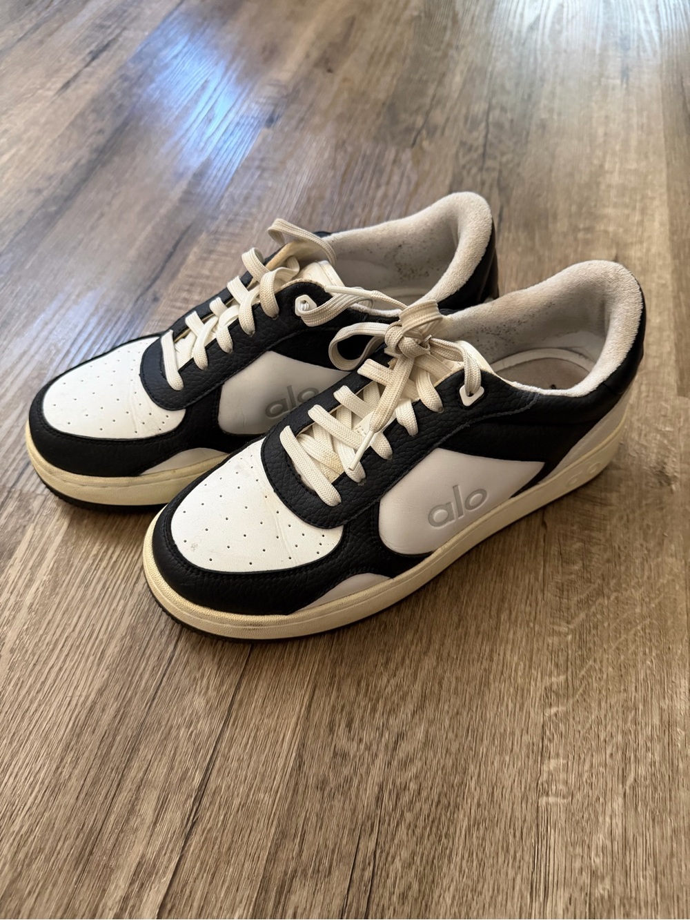 ALO Yoga Black and White Low-Top Sneakers with Cream Accents